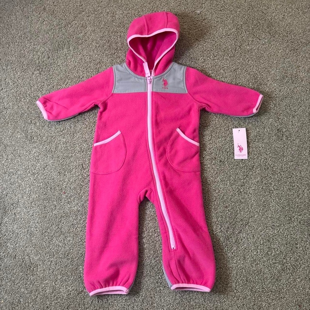 Pink U.S. Polo Assn. baby jumpsuit